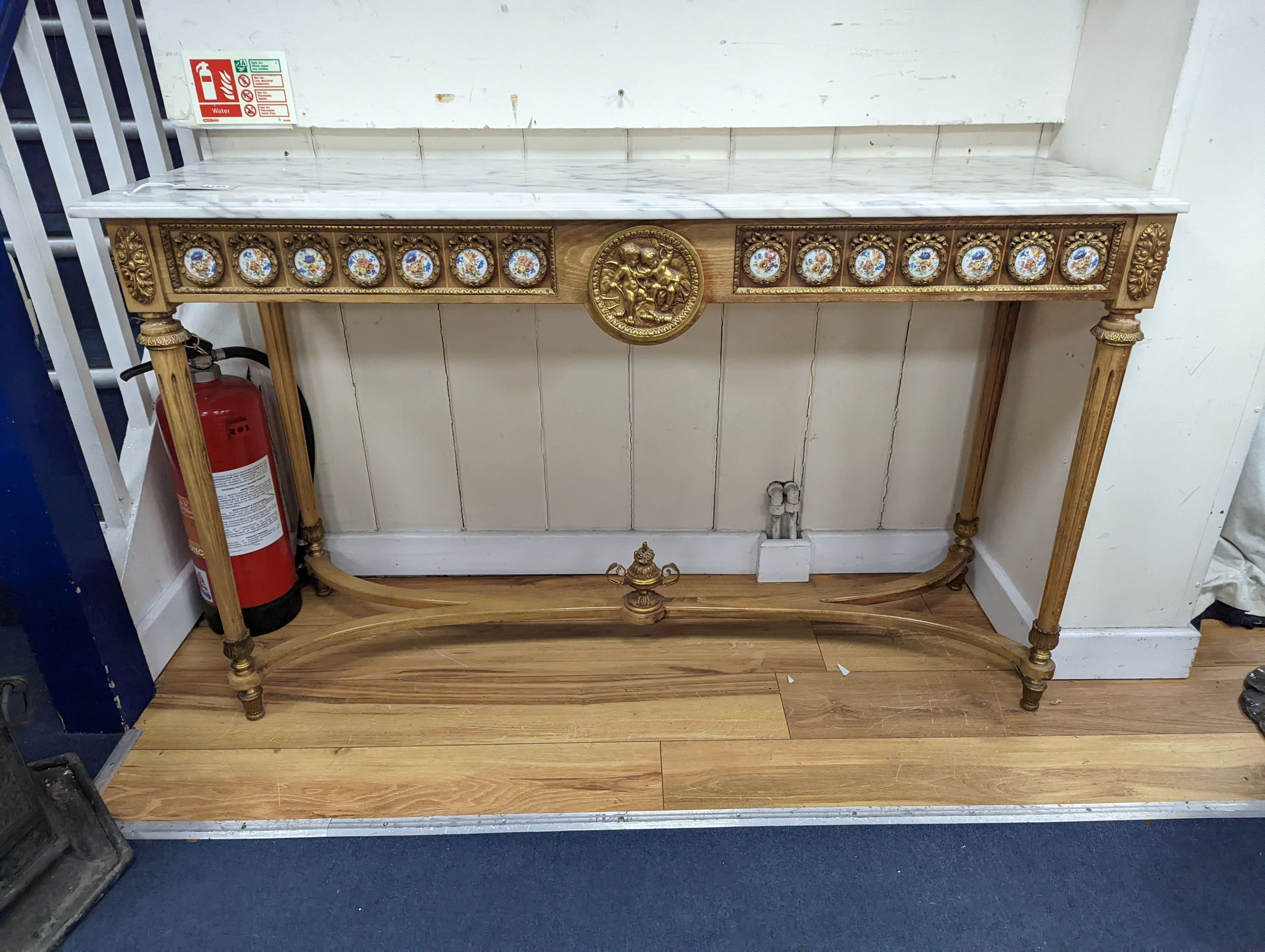 A Louis XVI style gilt metal and marble top console table, width 133cm, height 81cm